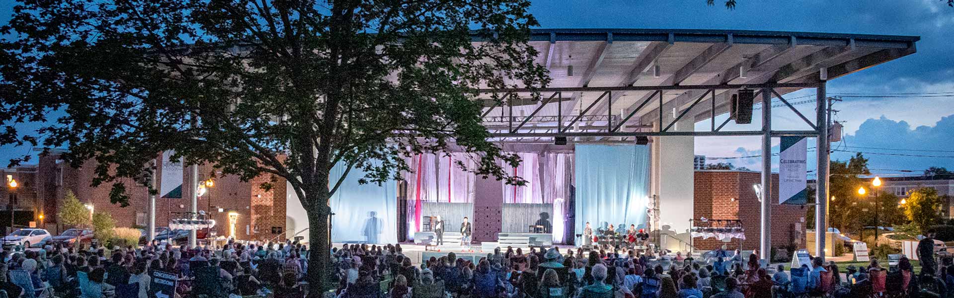 Shakespeare in the Park stage and crowd, photo © Kmiecik Imagery