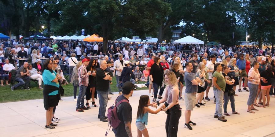 COWCrowd-press-release Tents and a Large crowd having fun at Cream of Wheaton Event