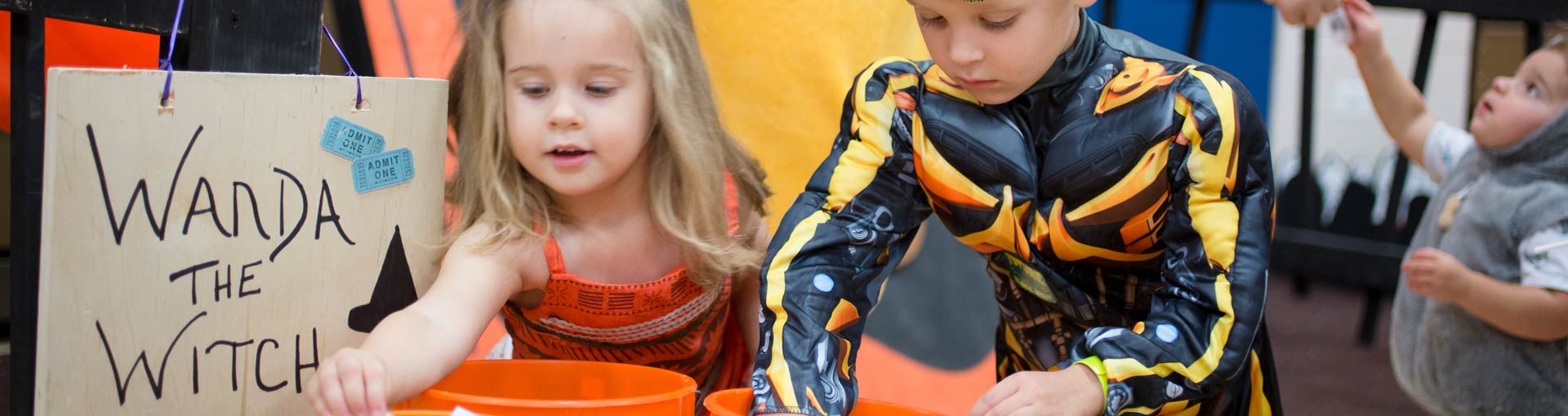 Kids in costumes at Halloween Happening