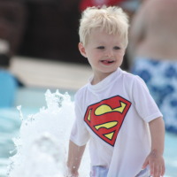 kid in swimming pool