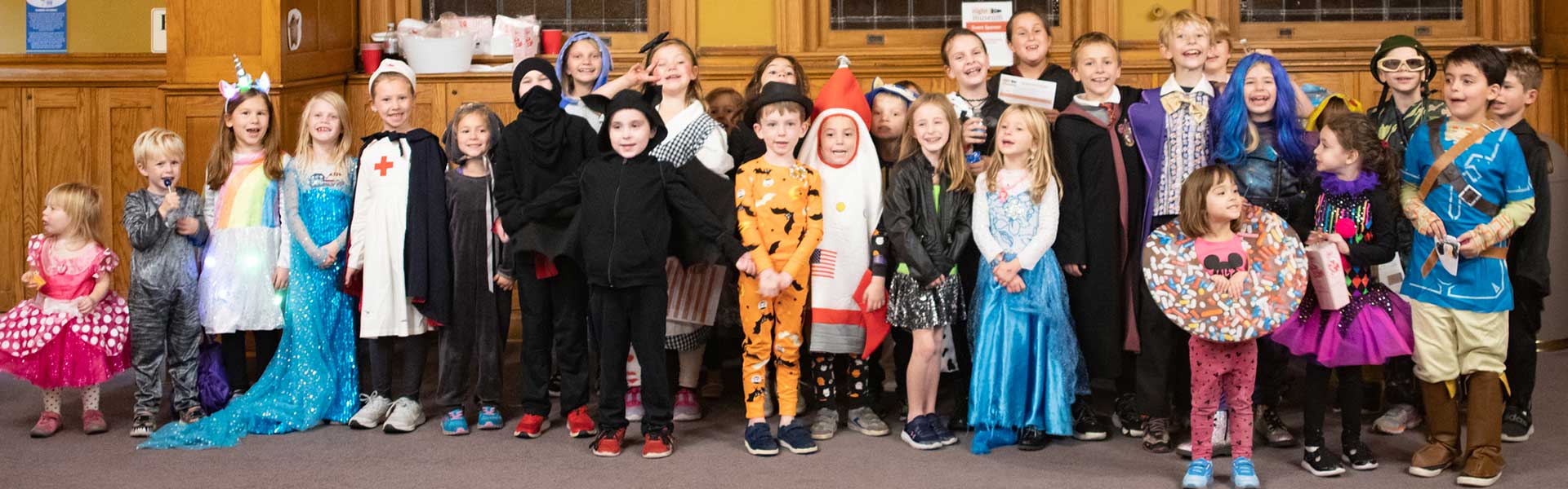Children dressed in halloween costumes during the Night at the Museum event