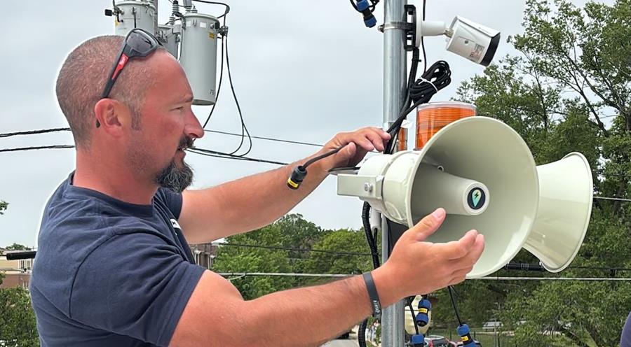Park District Staff work on installing new Perry Weather system. 