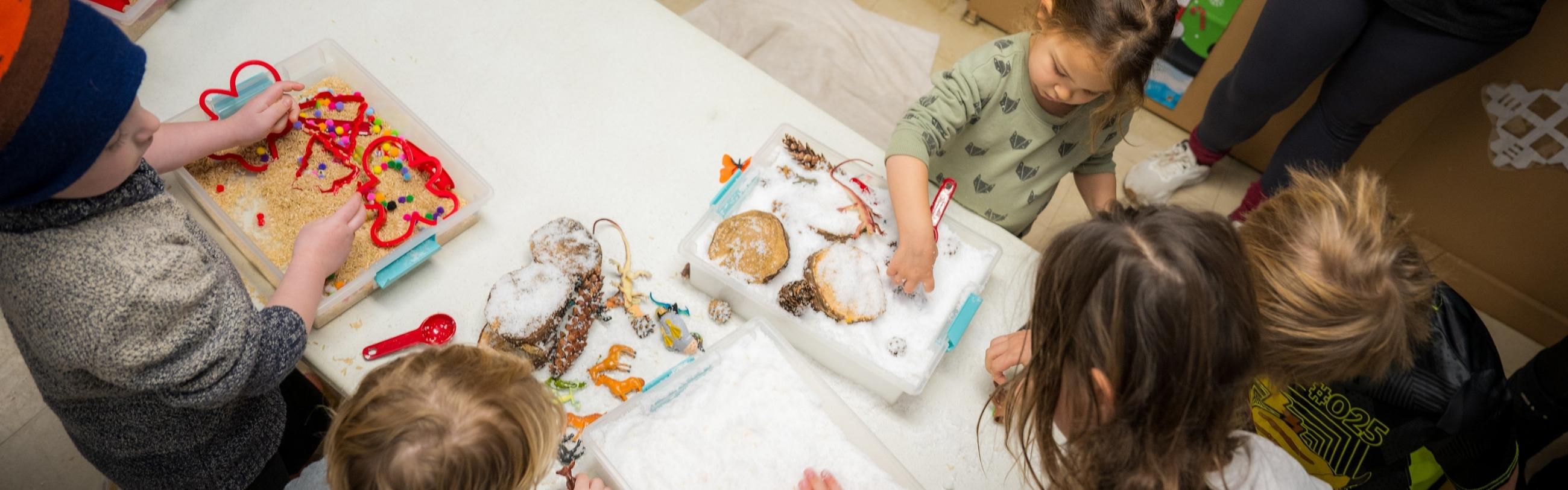 Children at a table making crafts